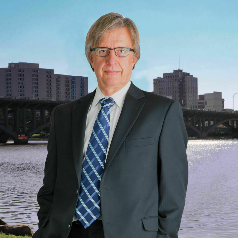 Headshot of Jim Black with outdoor background.