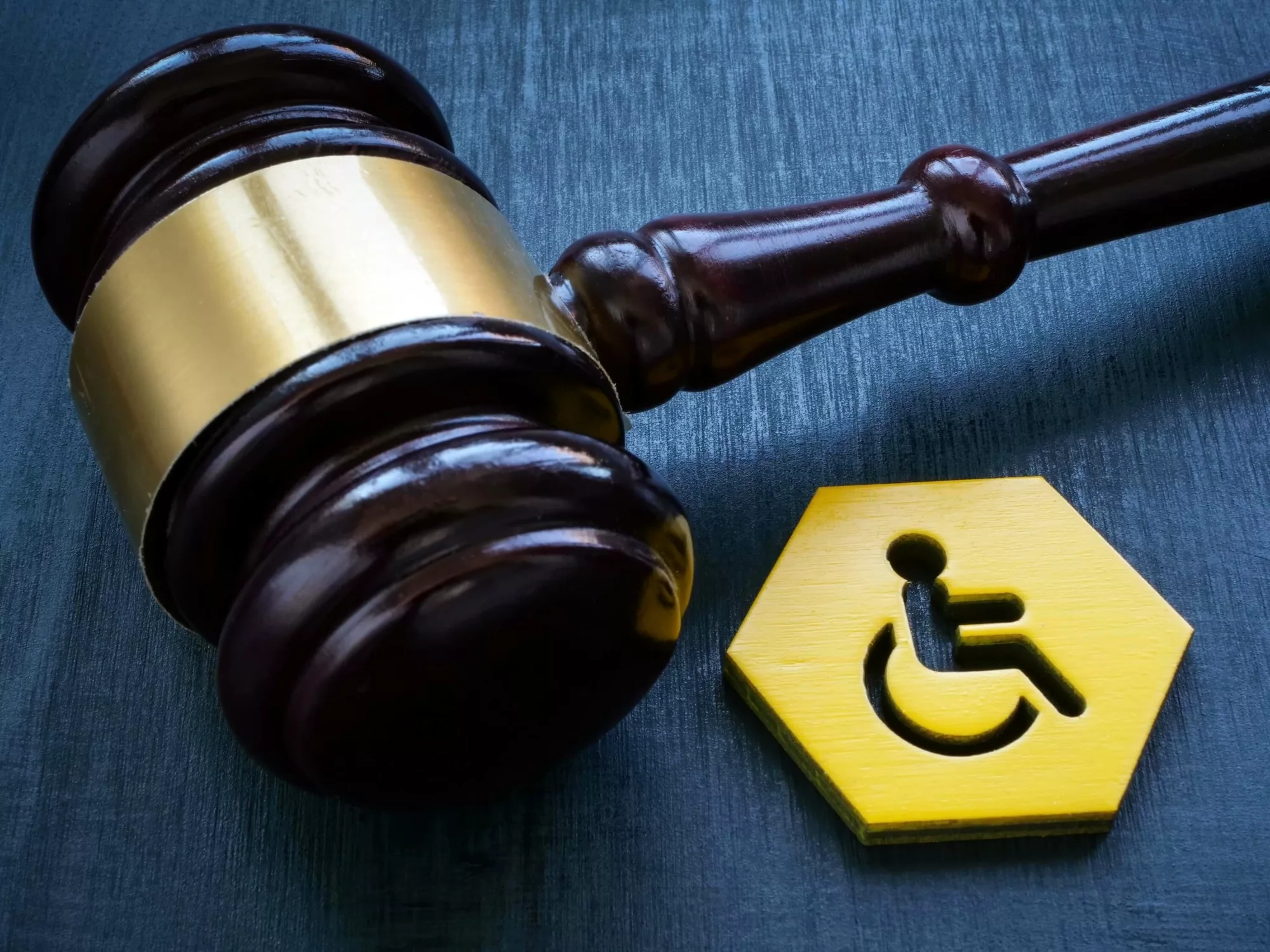 Gavel and disability symbol