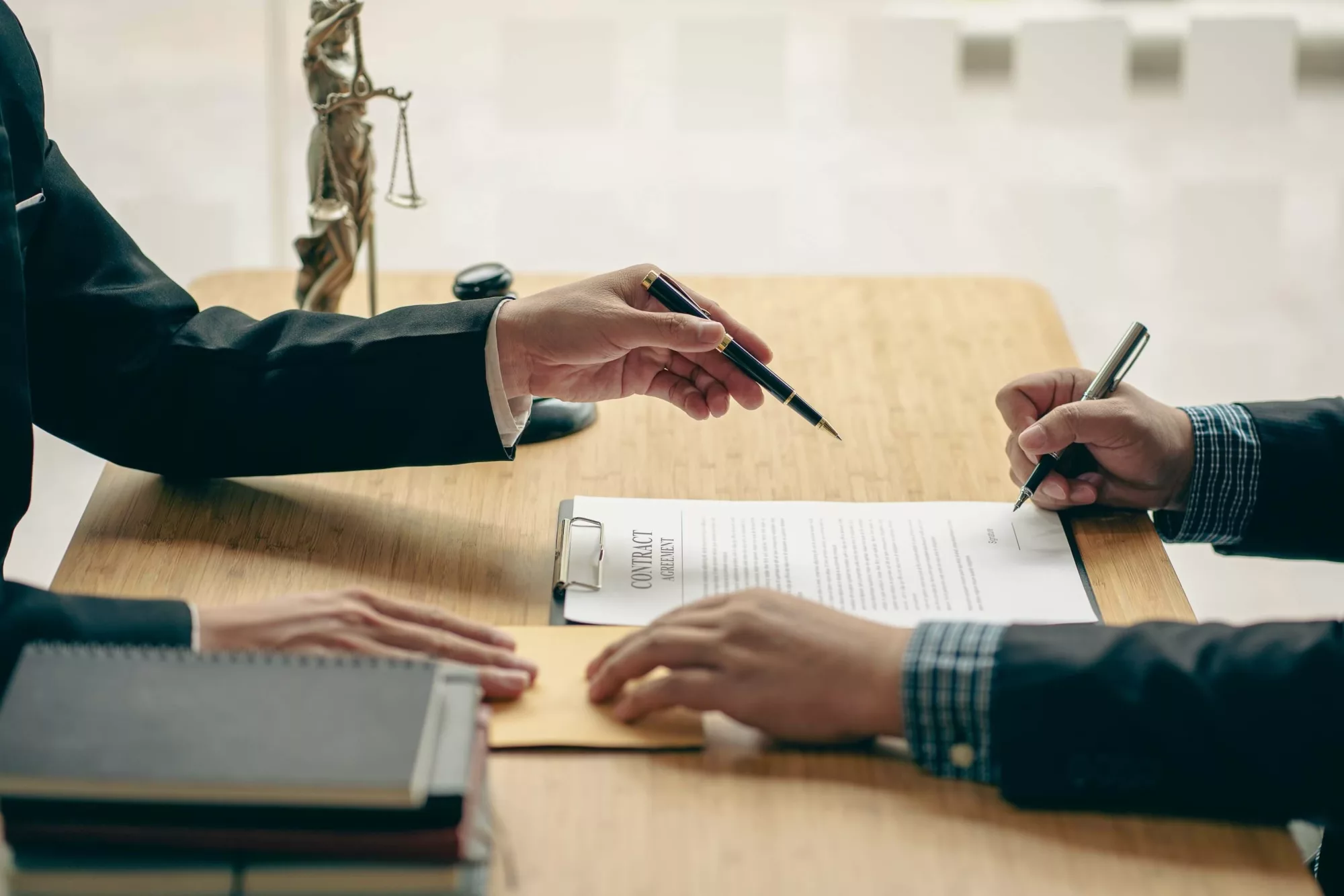 attorney and client discussing a document