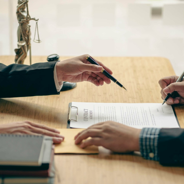 attorney and client discussing a document