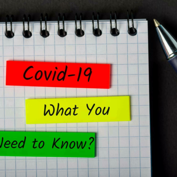 Paper and pen with text "COVID-19 What you need to know?"